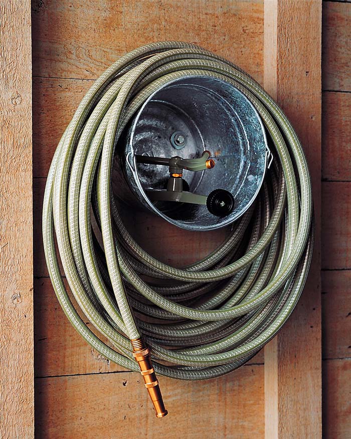 Bucket Hose Storage #gardentoolstorage #gardenhacks #decorhomeideas