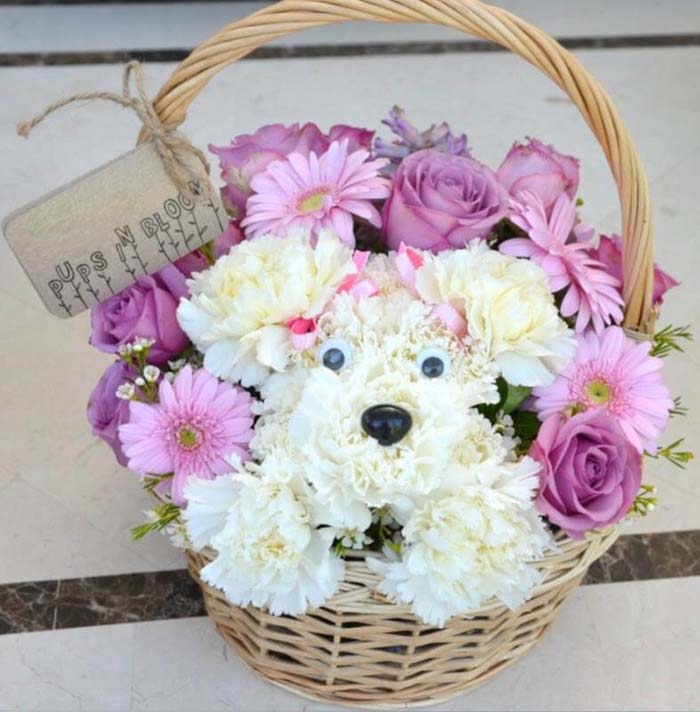 Cuddly Carnation Terrier Nestled in Basket #flowerarrangementsideas #flowerarrangement #decorhomeideas