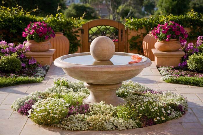 Elegant Mediterranian Inspired Fountain Bed #frontyardlandscapingideas #decorhomeideas