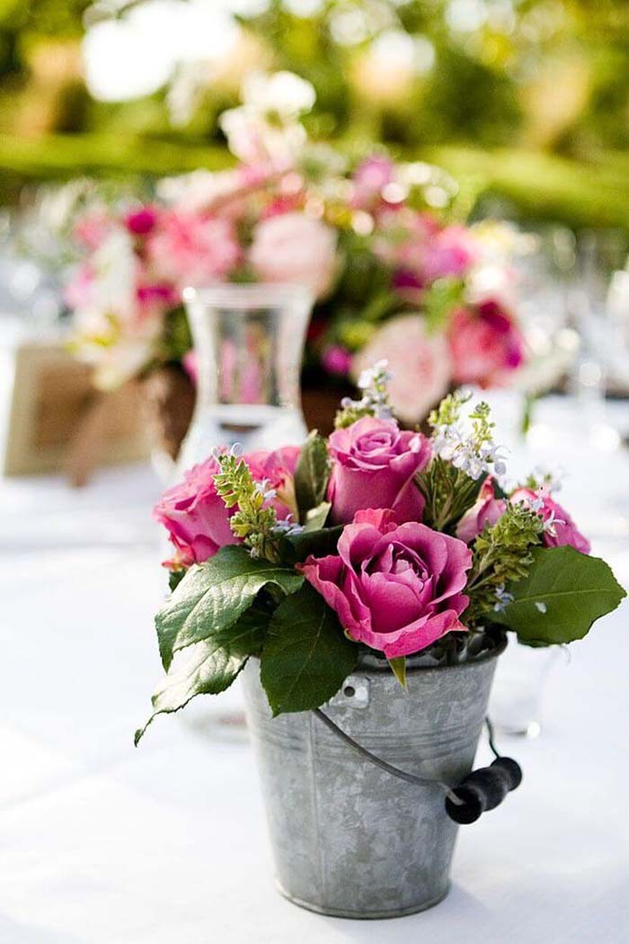 Fuchsia Roses in Metal Bucket Picnic Centerpiece #flowerarrangementsideas #flowerarrangement #decorhomeideas