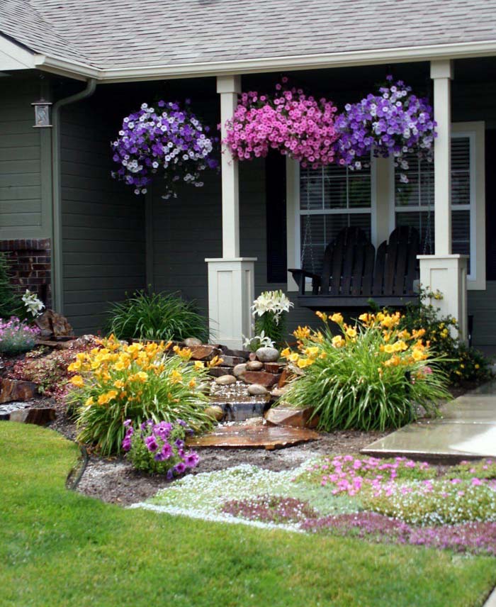 Porch Full of Petunias #frontyardlandscapingideas #decorhomeideas