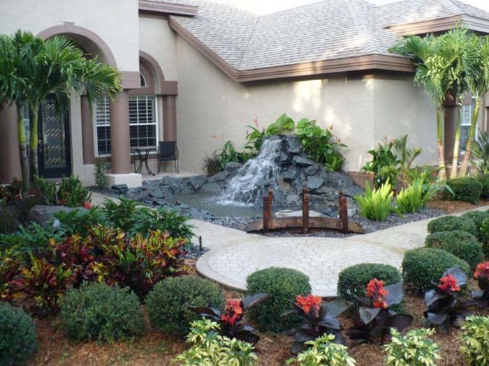 Showy Subtropical Water Feature #frontyardlandscapingideas #decorhomeideas