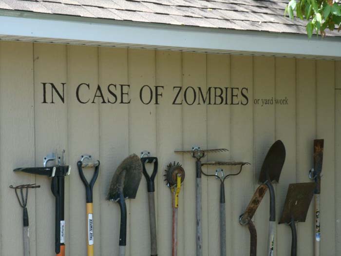 Storing Garden Tools with Style Aka Zombie Wall #gardentoolstorage #gardenhacks #decorhomeideas