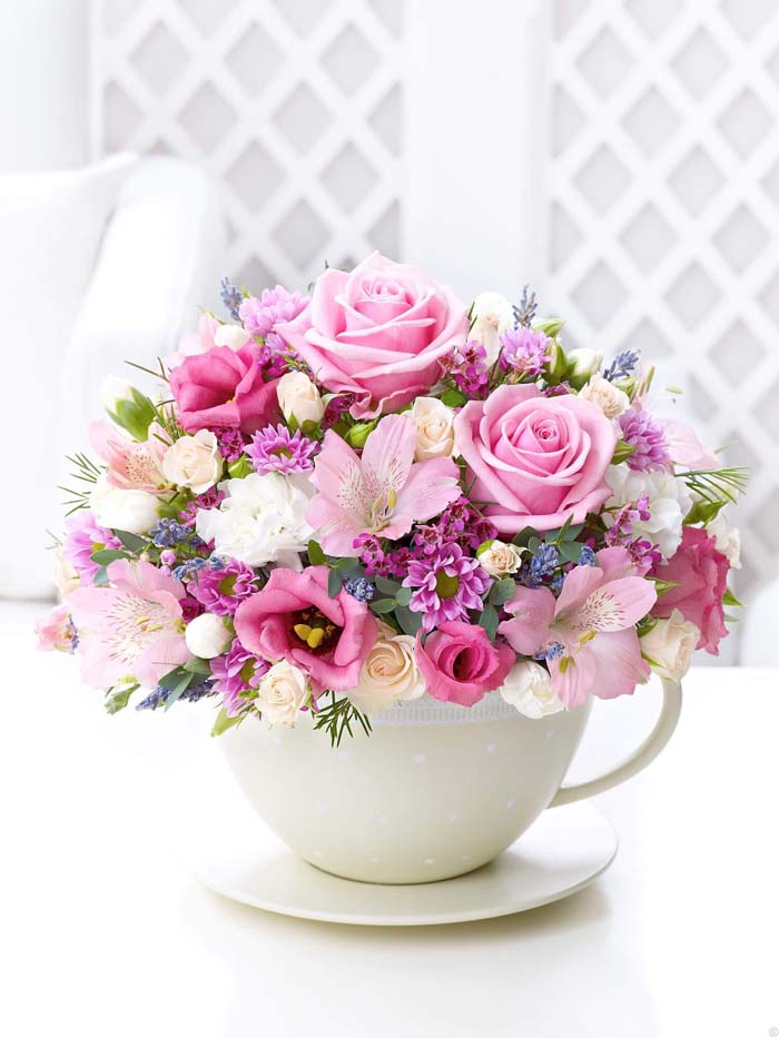 Teacup of Roses, Mums, and Austrolmaria #flowerarrangementsideas #flowerarrangement #decorhomeideas