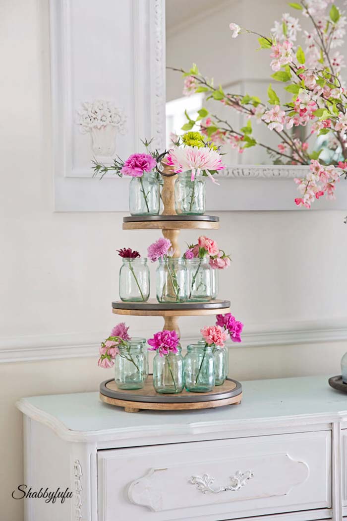 Three-tiered Stand for Mini Mason Jar Blooms #flowerarrangementsideas #flowerarrangement #decorhomeideas