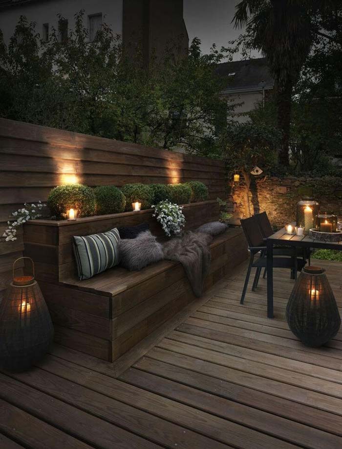 Upscale Outdoor Seating Bench Lit by Candles #backyardlightingideas #decorhomeideas