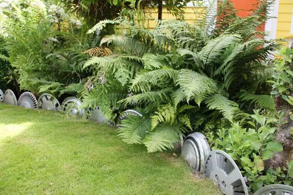 Upcycled Wheel Hubs #gardenedgingideas #decorhomeideas