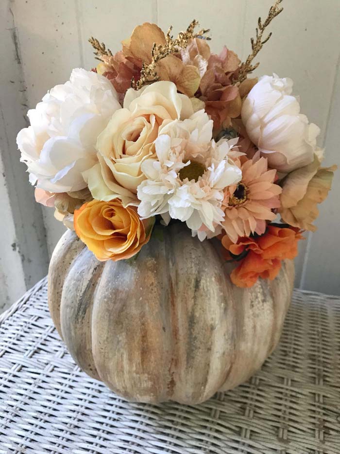 4. Big Neutral Blooms in a Pumpkin Vase #rusticfall #decorhomeideas