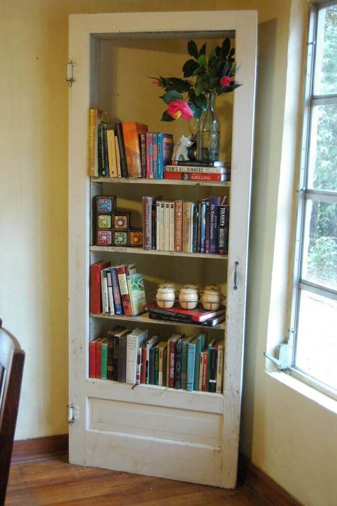 Book Shelves from Door and Reclaimed Wood #repurpose #olddoors #decorhomeideas