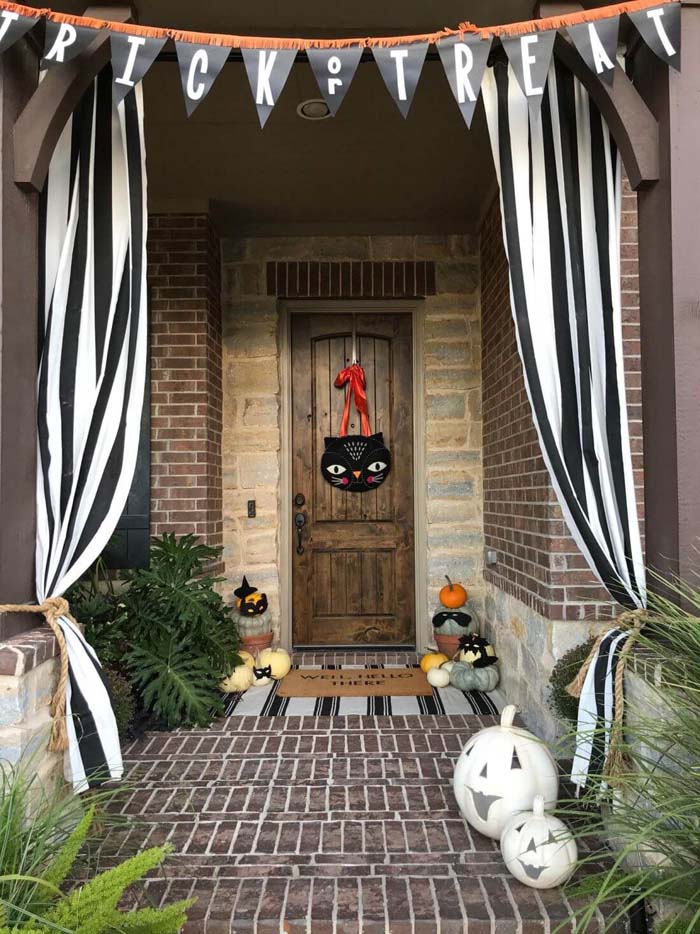 8. Curtains Lead the Way to My Halloween Porch #frontporch #halloween #decorhomeideas