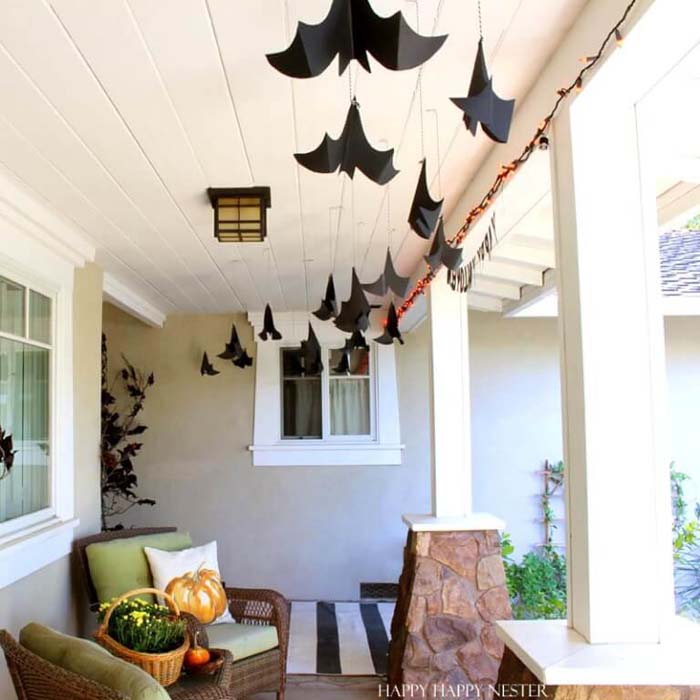 24. Hanging Cauldron of Bats on Your Porch #frontporch #halloween #decorhomeideas