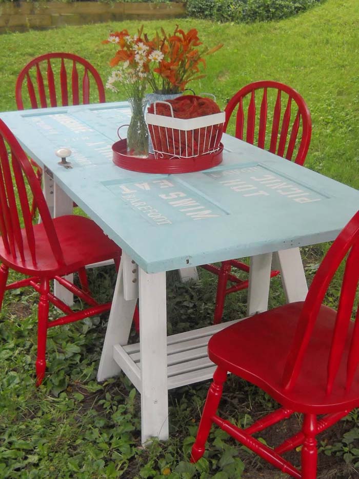 Outdoor Table DIY with Stenciling Detail #repurpose #olddoors #decorhomeideas