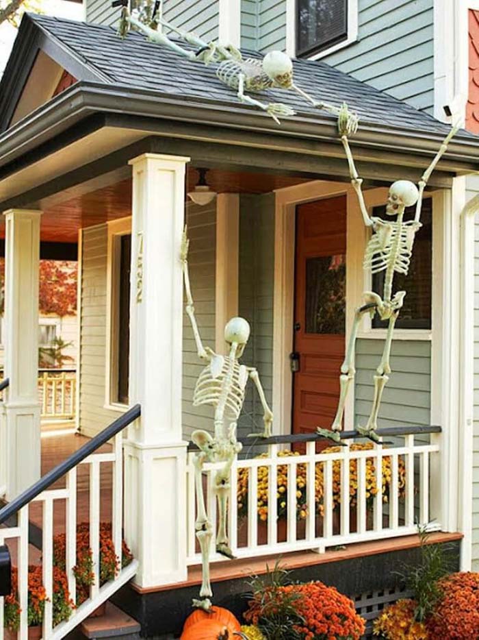 48. Skeletons on the Roof #frontporch #halloween #decorhomeideas