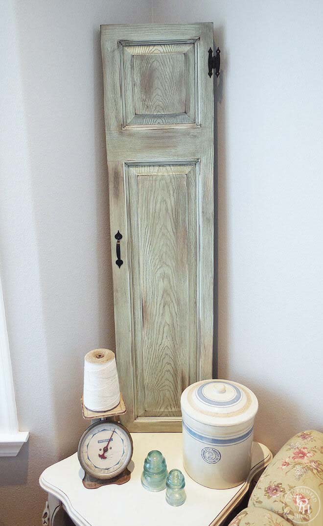 Upcycled Door into Faux Window Shutters #repurpose #olddoors #decorhomeideas