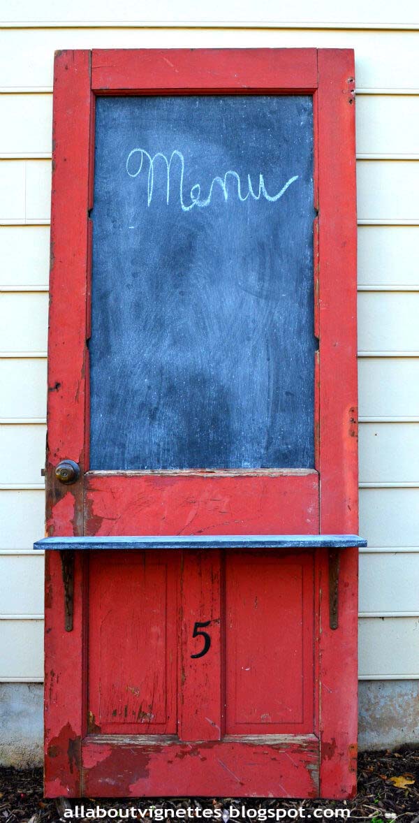 Upcycled Door with Chalkboard and Shelf #repurpose #olddoors #decorhomeideas