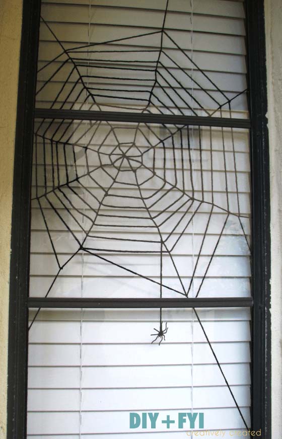 65. Window Spider Web and Dangling Spider #frontporch #halloween #decorhomeideas