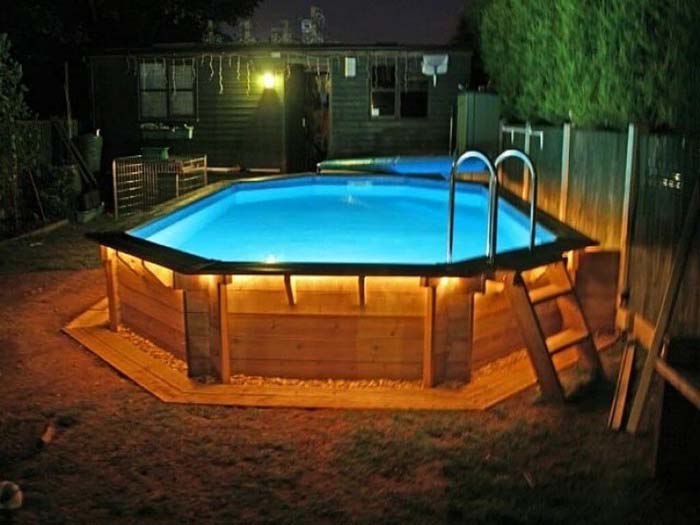 1. A Glowing Deck #abovegroundpoolwithdeck #decorhomeideas