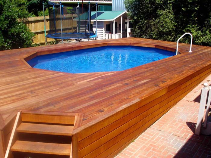 4. Above-Ground Pool with A Trampoline #abovegroundpoolwithdeck #decorhomeideas