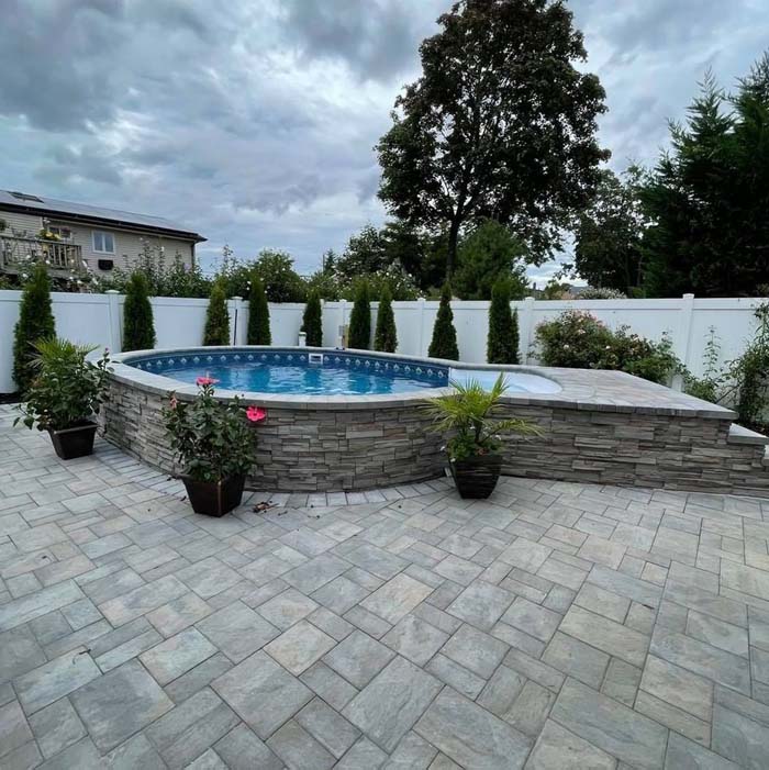 9. Above Ground Pool With Deck Made Of Stones #abovegroundpoolwithdeck #decorhomeideas