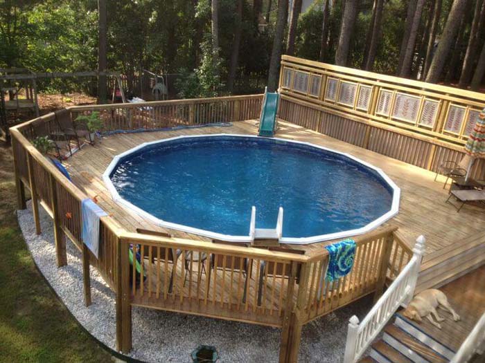 20. Above-Ground Swimming Pool with Slides #abovegroundpoolwithdeck #decorhomeideas