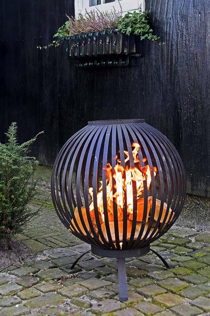 1. Attractive Black Metal Fire Pit Ball #metalfirepit #decorhomeideas