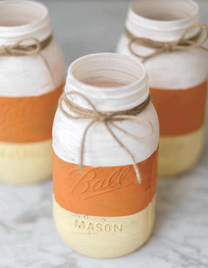 8. Candy Corn Mason Jars #dollarstore #falldecor #diy #decorhomeideas