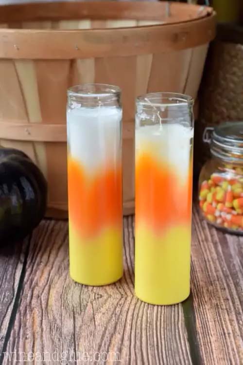 9. Candy Corn Spray Painted Jar Candles #dollarstore #falldecor #diy #decorhomeideas