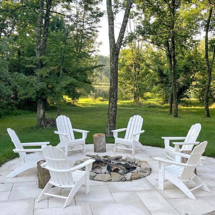 2. Classic In-Ground Stone Fire Pit and White Adirondack Chairs #firepit #seating #decorhomeideas