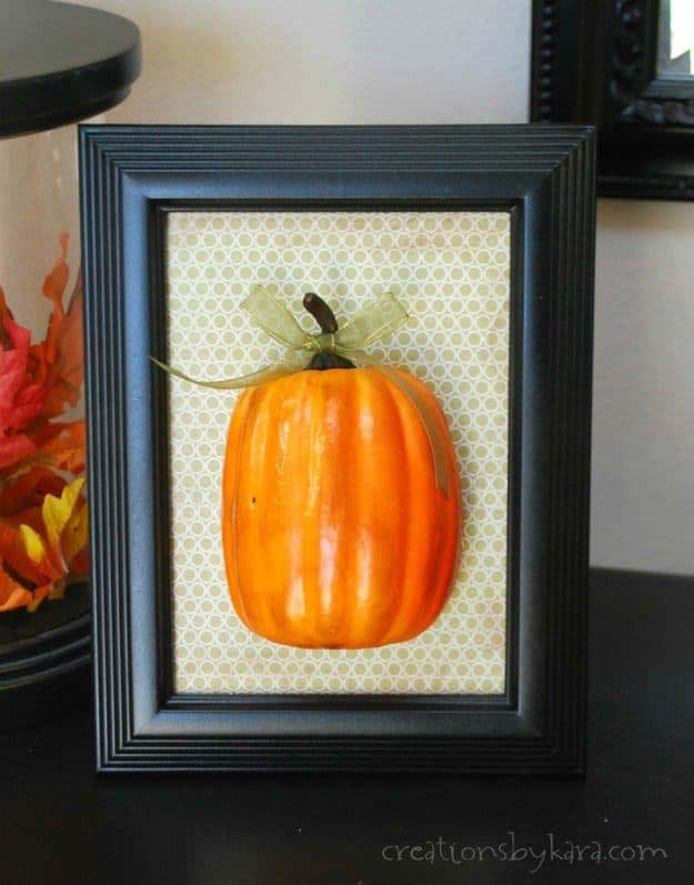 36. Framed Plastic Pumpkin #dollarstore #falldecor #diy #decorhomeideas