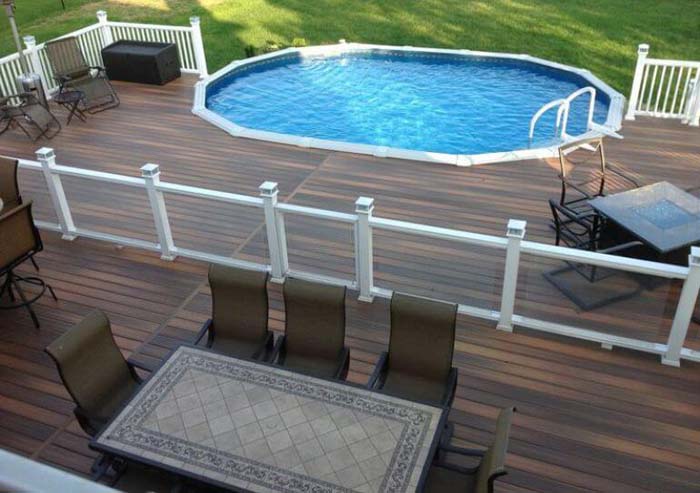 31. Oval Above-Ground Pool with A Lounge #abovegroundpoolwithdeck #decorhomeideas