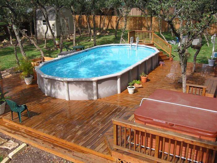 32. Oval Above-Ground Swimming Pool #abovegroundpoolwithdeck #decorhomeideas