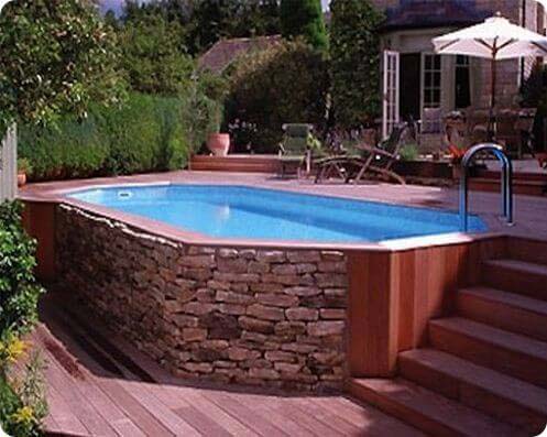 36. Pool Wrapped in Wood and Stone #abovegroundpoolwithdeck #decorhomeideas