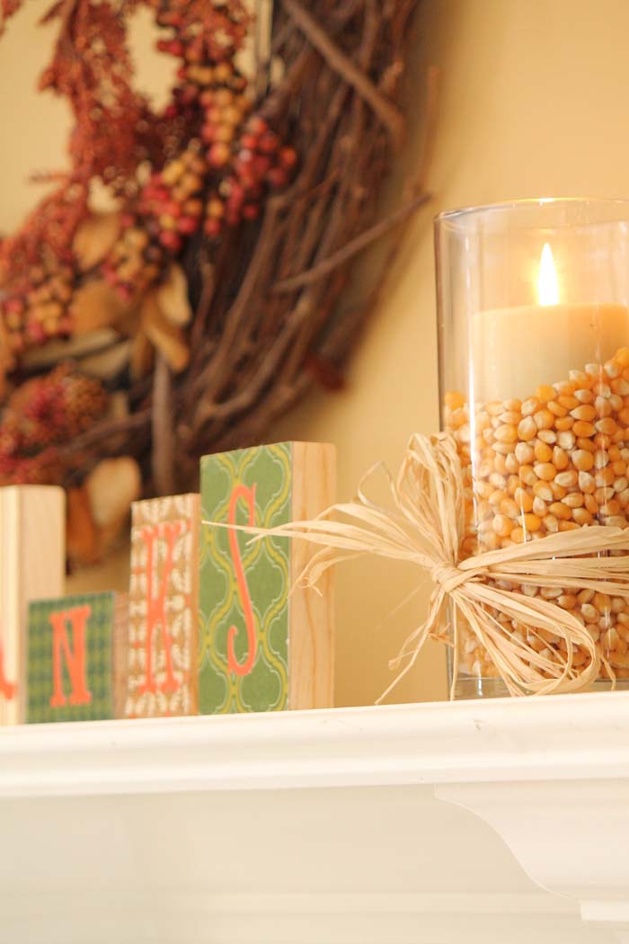 44. Popcorn Kernel Filled Candleholder #dollarstore #falldecor #diy #decorhomeideas