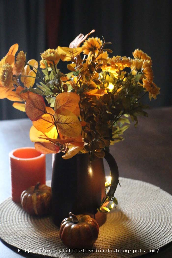 22. Pretty as a Pitcher Fall Floral Arrangements #fallflowers #arrangements #decorhomeideas