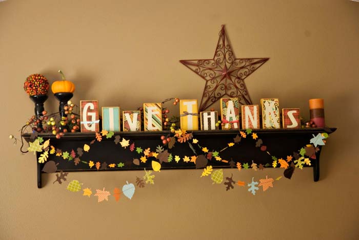 43. Wooden Blocks with Printed Papers and Paper Leave Garlands for Mantel #thanksgiving #decor #decorhomeideas