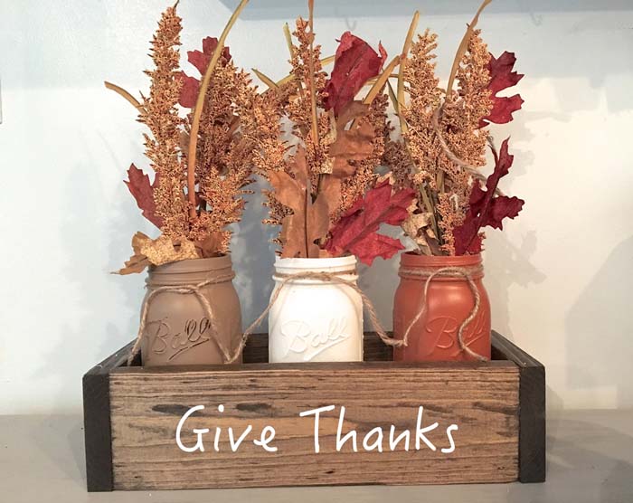 Painted Mason Jar Crate with Hand-tied Fall Foliage Bouquets #thanksgiving #centerpieces #decorhomeideas