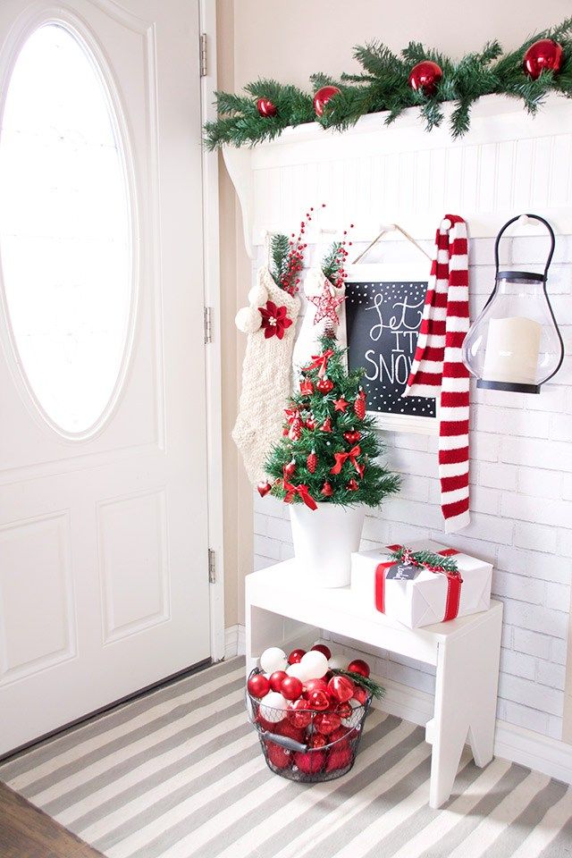 Simple Scandinavian White And Red Christmas Entryway