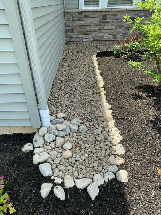 A Big And Long Pebble Dry Creek #downspout #landscaping #rocks #decorhomeideas