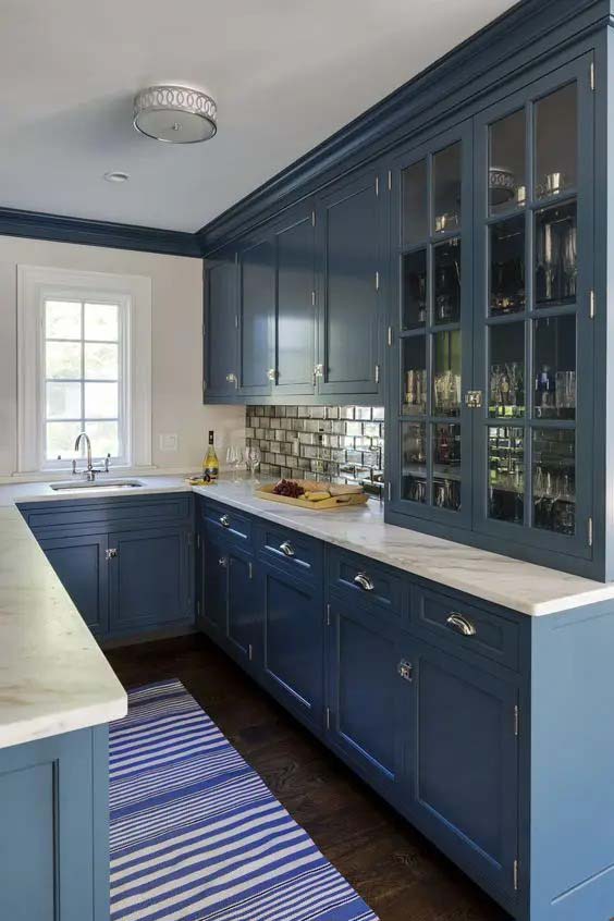Blue Cabinets and Tiled Backsplash #ushaped #kitchen #decorhomeideas