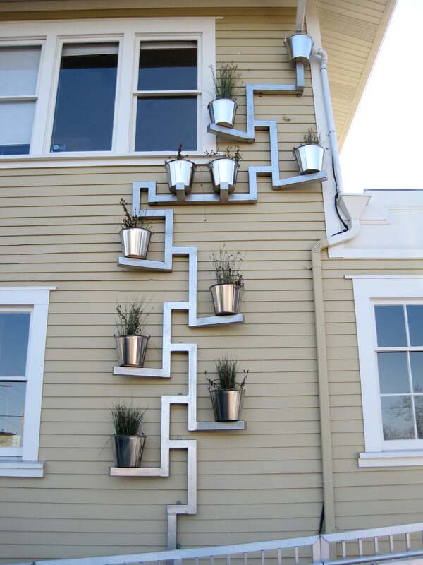 Downspout Planter #downspout #landscaping #rocks #decorhomeideas