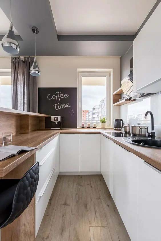 Minimalist U-shaped Kitchen With Dark Wood Floor and Countertops #ushaped #kitchen #decorhomeideas