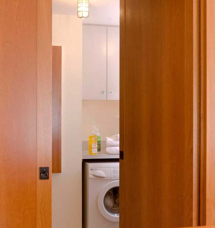 Flat-Panel Door for Seamless Contemporary Look #laundry #closetdoors #decorhomeideas