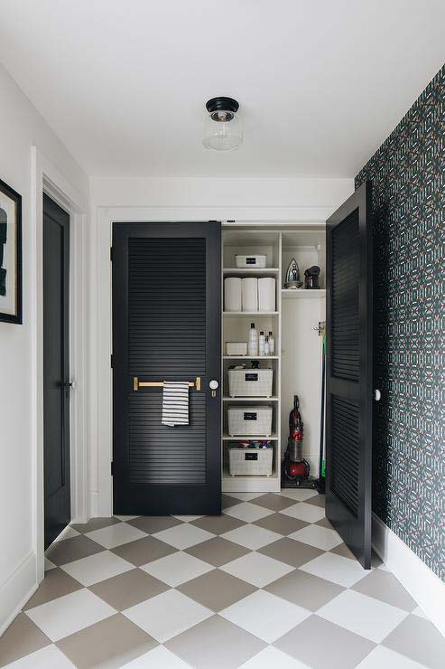 Laundry Room Closet with Black Shutter Doors #laundry #closetdoors #decorhomeideas