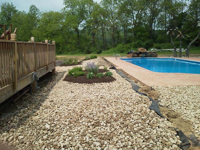 Pea Gravel Replaces Cement and Grass #abovegroundpool #landscapingideas #decorhomeideas