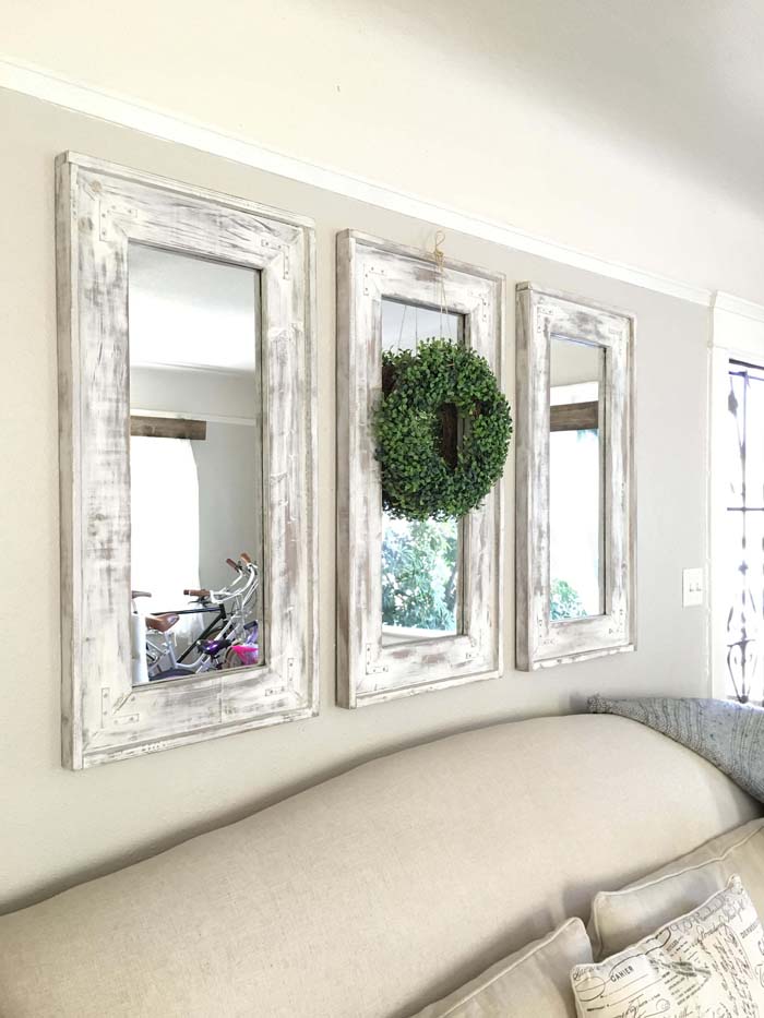 Retrofitted Wall Mirrors with Natural Wreath Accent #rustic #walldecor #decorhomeideas