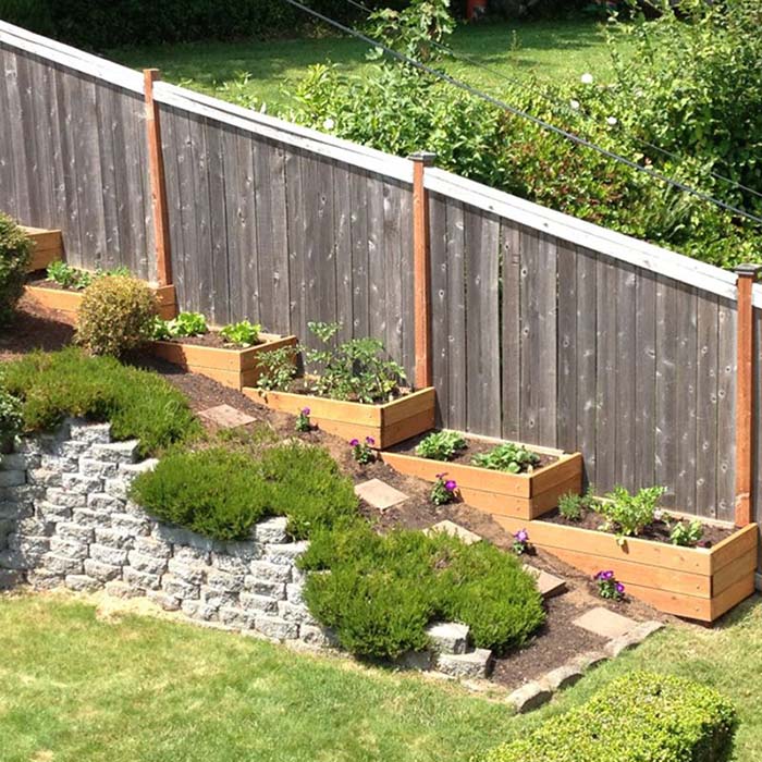 Sloped Backyard With Flower Beds