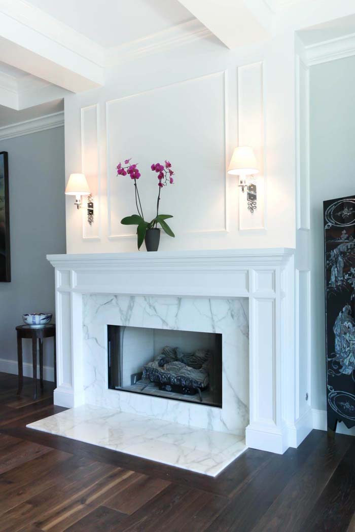 Classic White Paneling with Marble Surround #fireplace #design #decorhomeideas