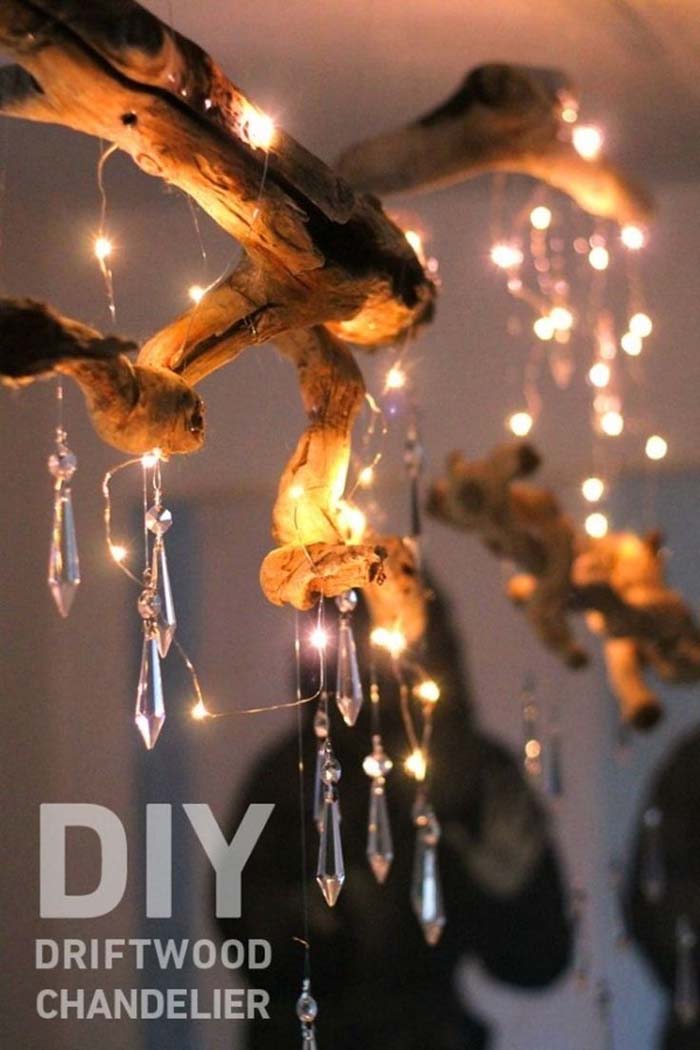 Contrast Driftwood with Crystal for This Chandelier #roomdecorationwithlights #decorhomeideas