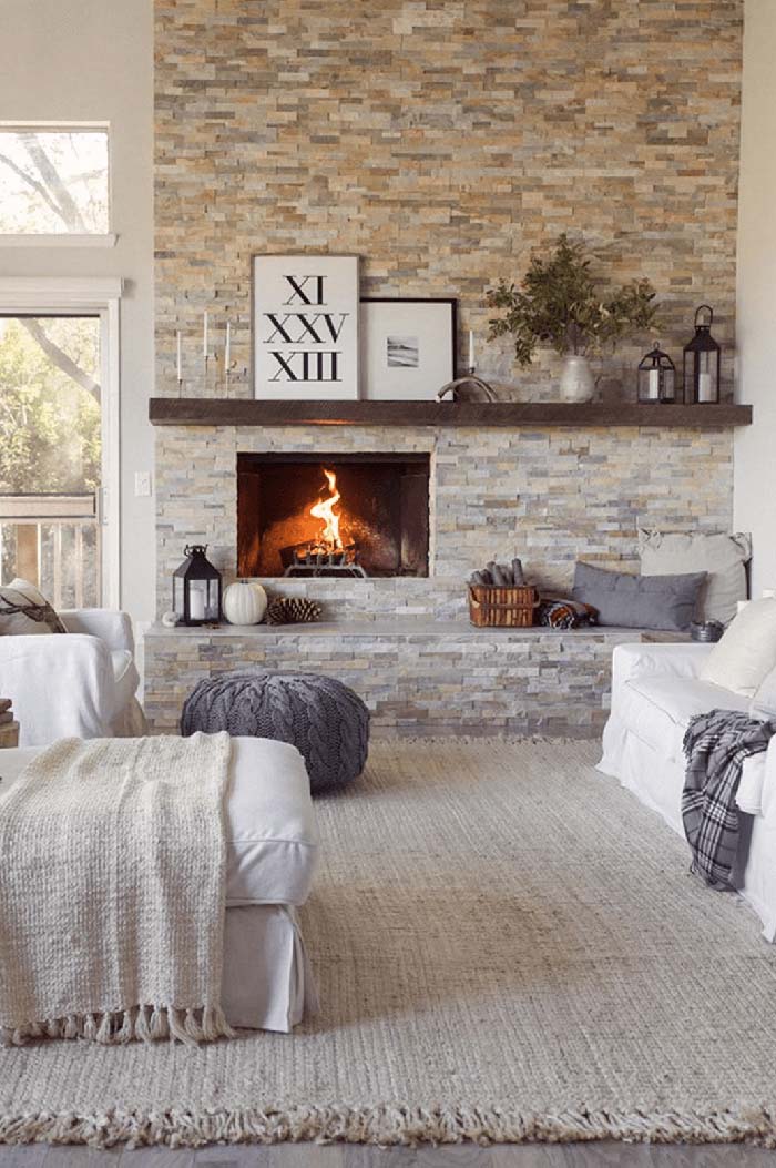 Full-Length Mantle Floats Amidst Stone Facade #fireplace #design #decorhomeideas