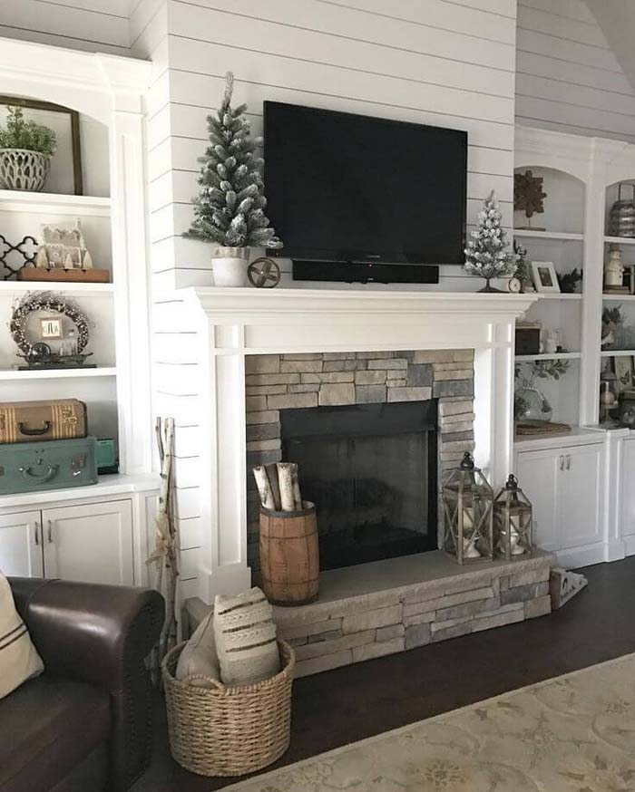 Horizontal Lines Top a Stone Surround #fireplace #design #decorhomeideas